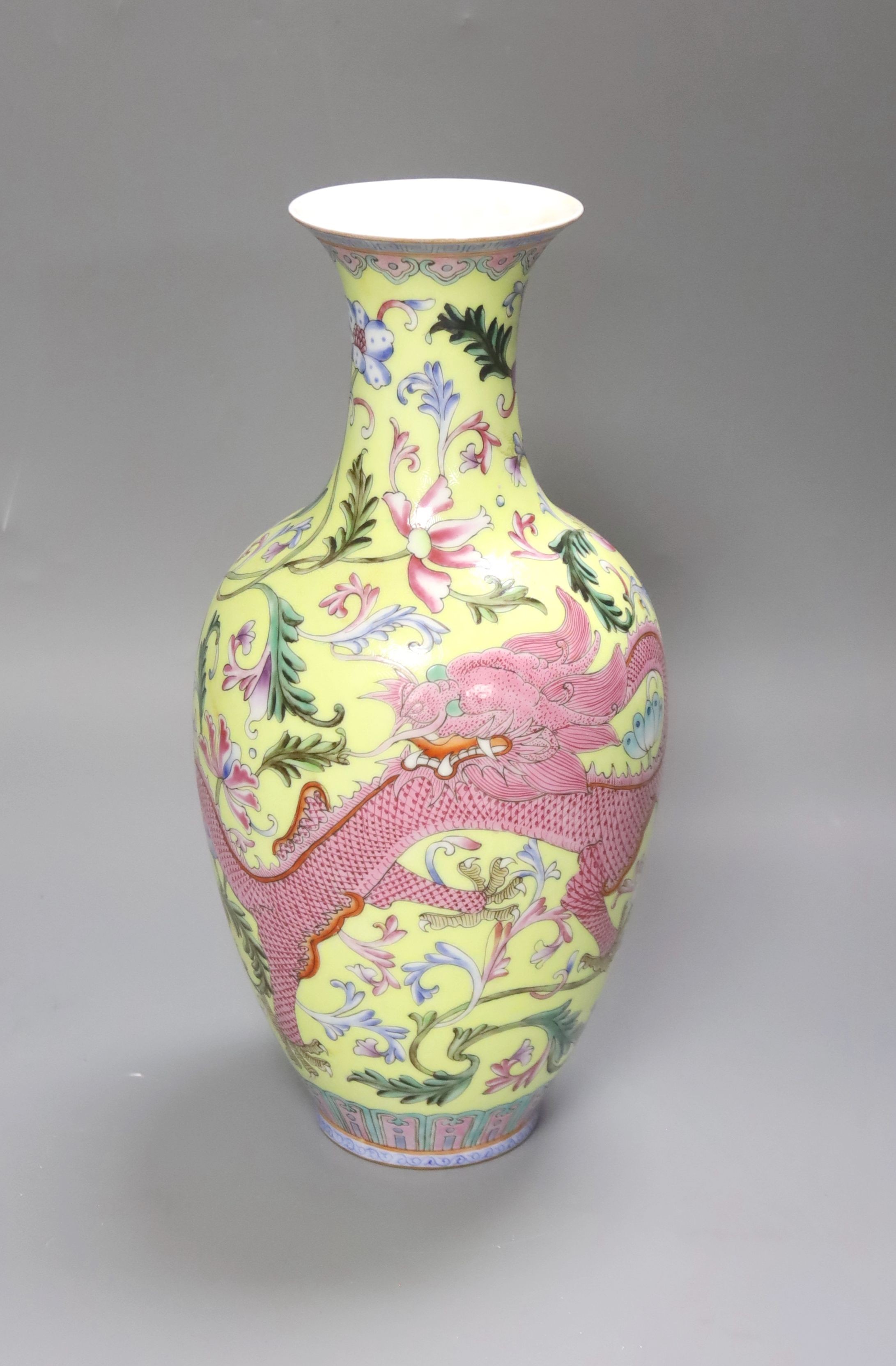 A Chinese porcelain yellow sgraffito ground ‘dragon’ vase, Qianlong seal mark, Republic period, 30cm